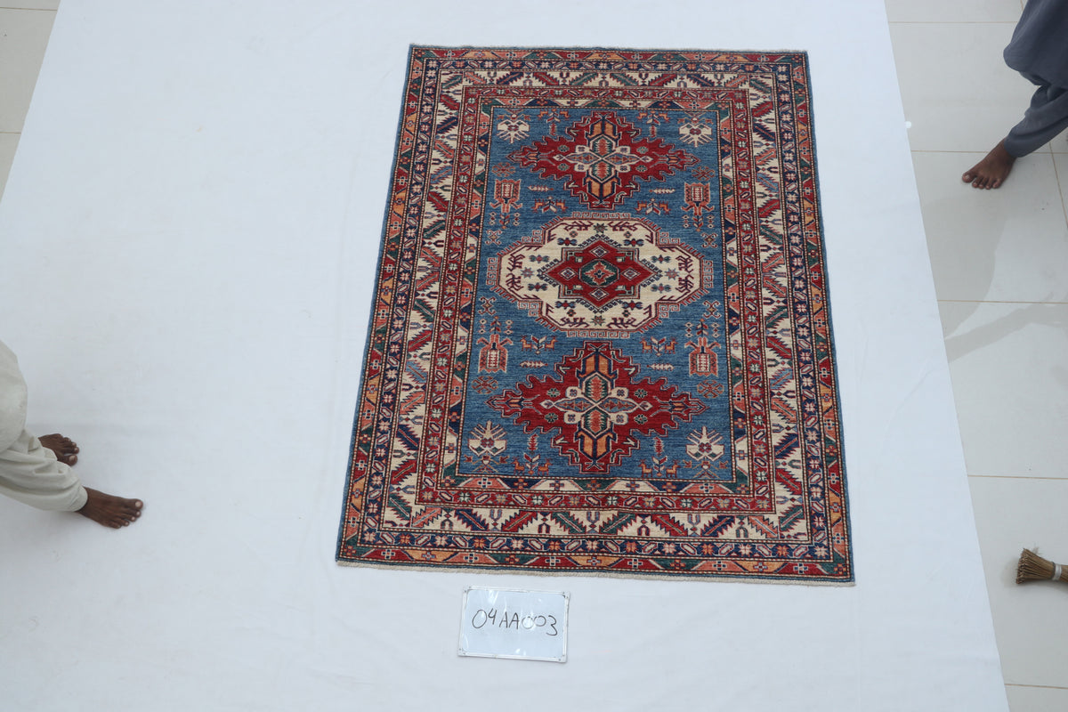 Detail view 2 of blue Super Kazak handwoven wool rug, 5 x 6.5 ft