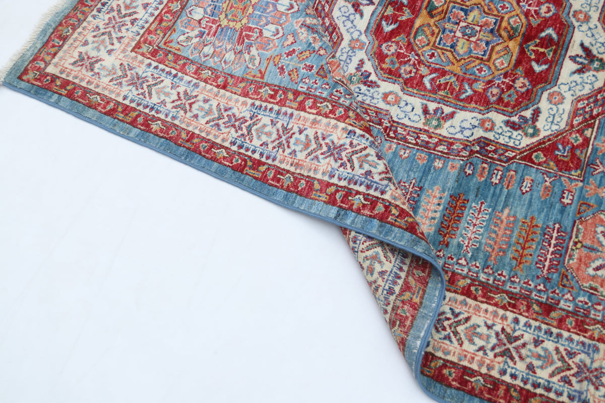 Detail 9 of blue floral Super Kazak cotton-and-wool rug, 5 x 7 ft