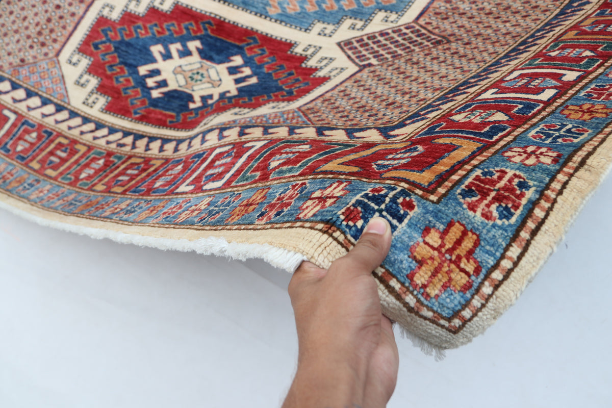 Detail 11 of beige floral Super Kazak cotton-and-wool rug, 5.5 x 8 ft