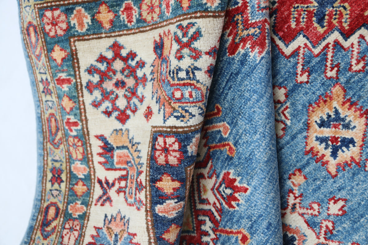 Detail 10 of blue floral Super Kazak cotton-and-wool rug, 7 x 10 ft