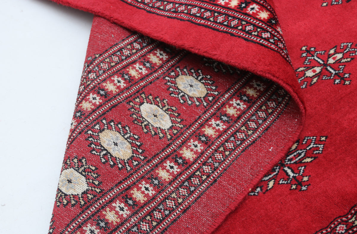Detail view 8 of red Mori Bokhara handwoven wool rug, 6 x 9 ft