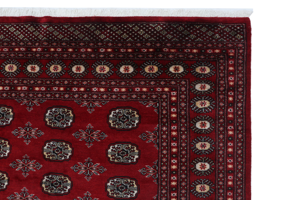 Detail view 9 of red Mori Bokhara handwoven wool rug, 7 x 10 ft