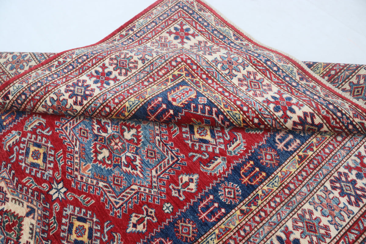 Detail view 8 of red Super Kazak handwoven wool rug, 5 x 6.5 ft
