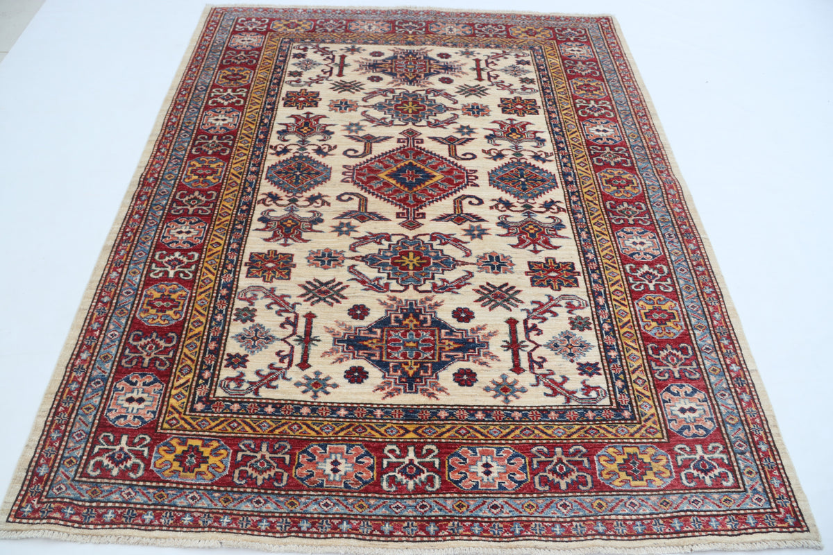 Detail view 2 of beige Super Kazak handwoven wool rug, 5 x 6 ft