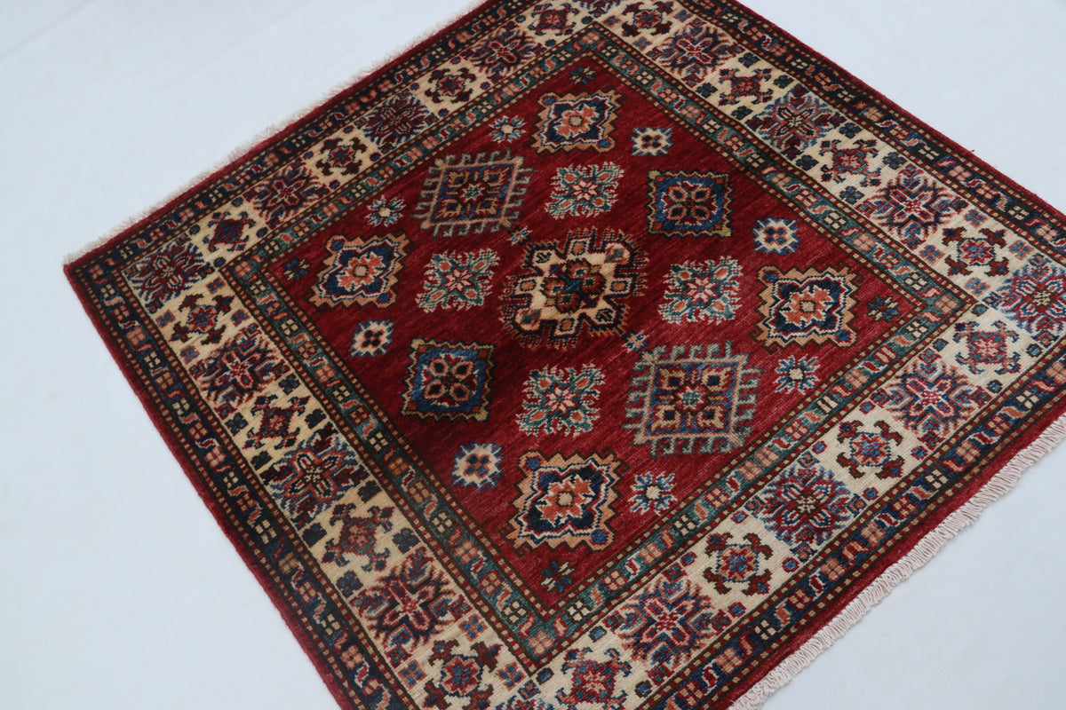 Detail 3 of red floral Super Kazak cotton-and-wool rug, 3.5 x 3.5 ft