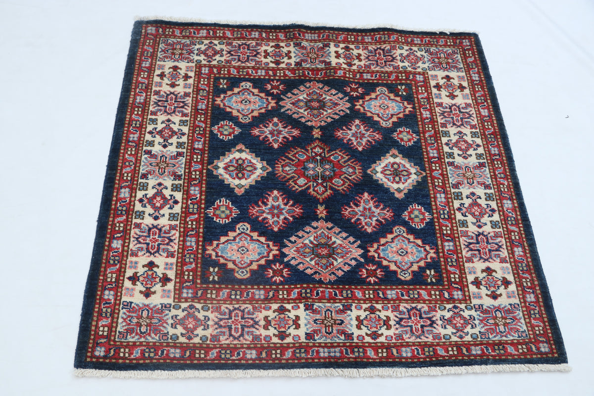Detail 2 of blue floral Super Kazak cotton-and-wool rug, 3.5 x 3.5 ft