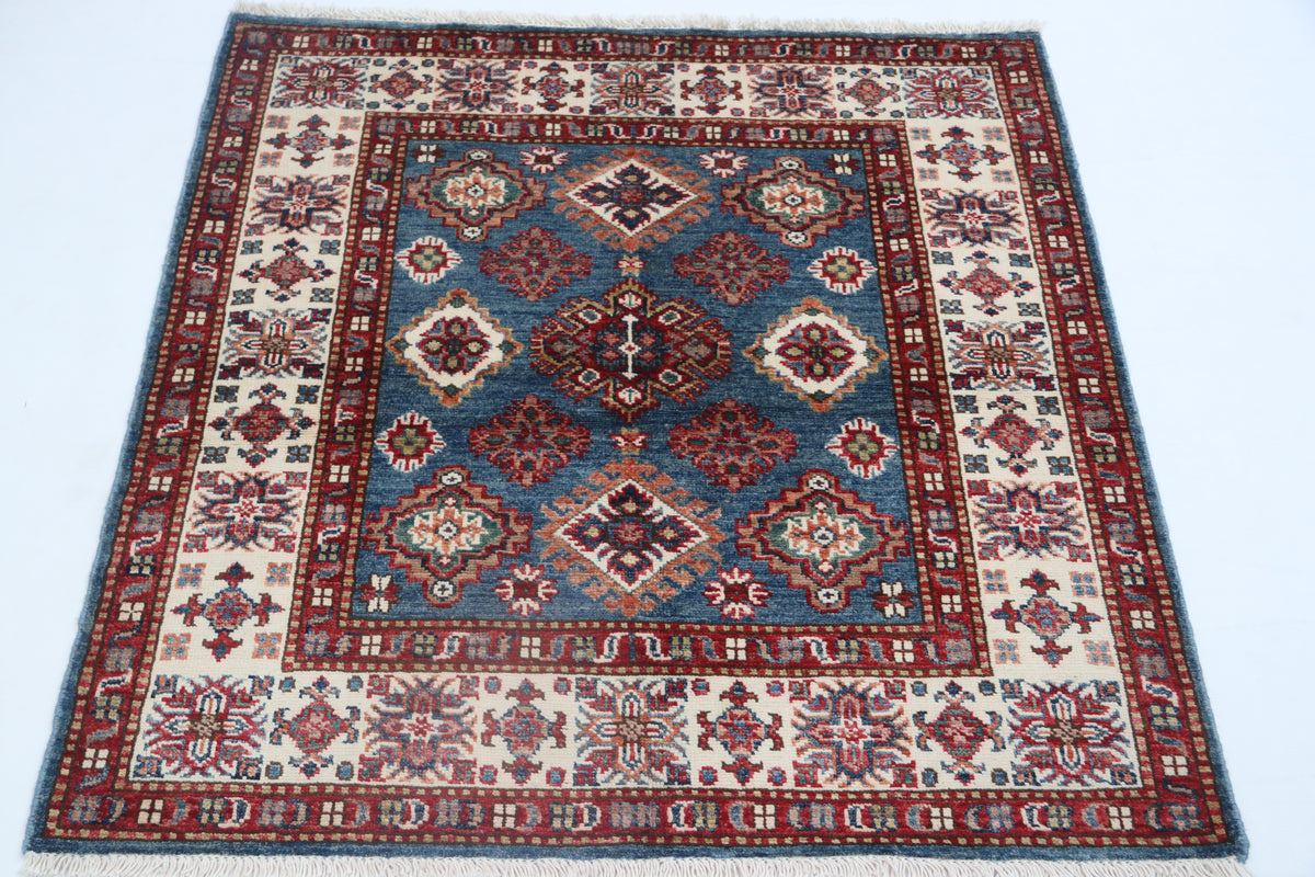 Detail 2 of blue floral Super Kazak cotton-and-wool rug, 3.5 x 3.5 ft
