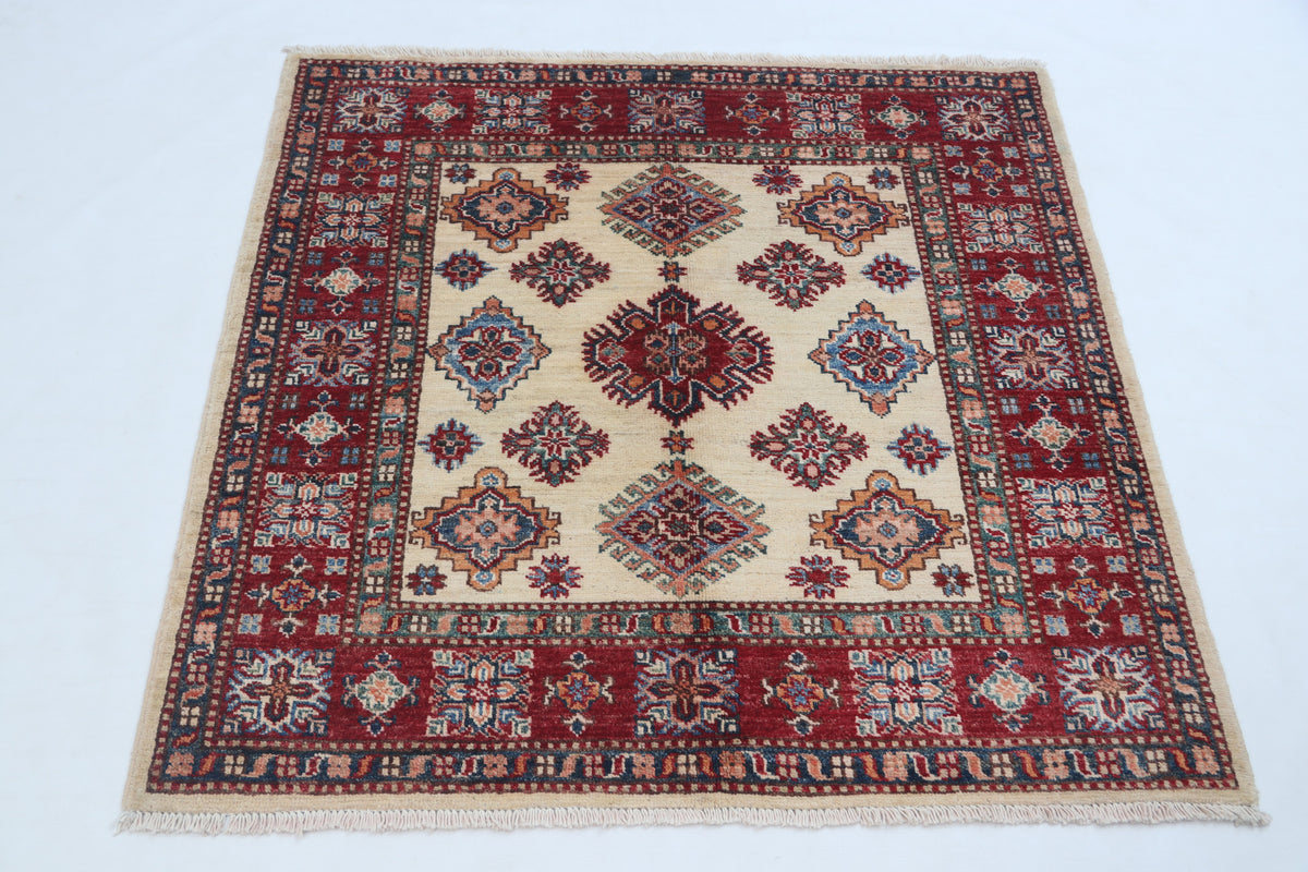 Detail view 2 of beige Super Kazak handwoven wool rug, 3.5 x 3.5 ft