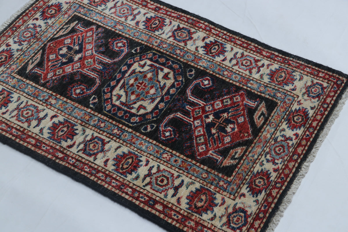 Detail 3 of black floral Super Kazak cotton-and-wool rug, 2 x 3 ft