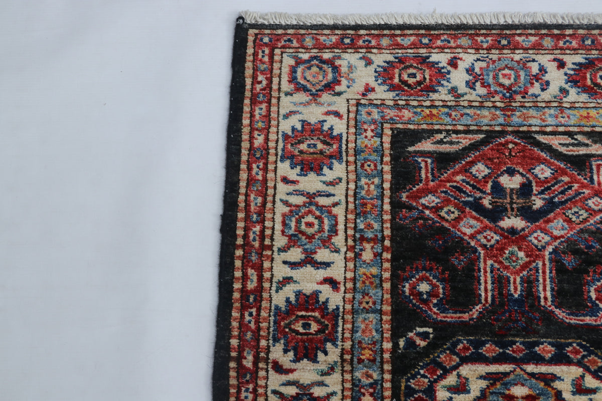 Detail 5 of black floral Super Kazak cotton-and-wool rug, 2 x 3 ft