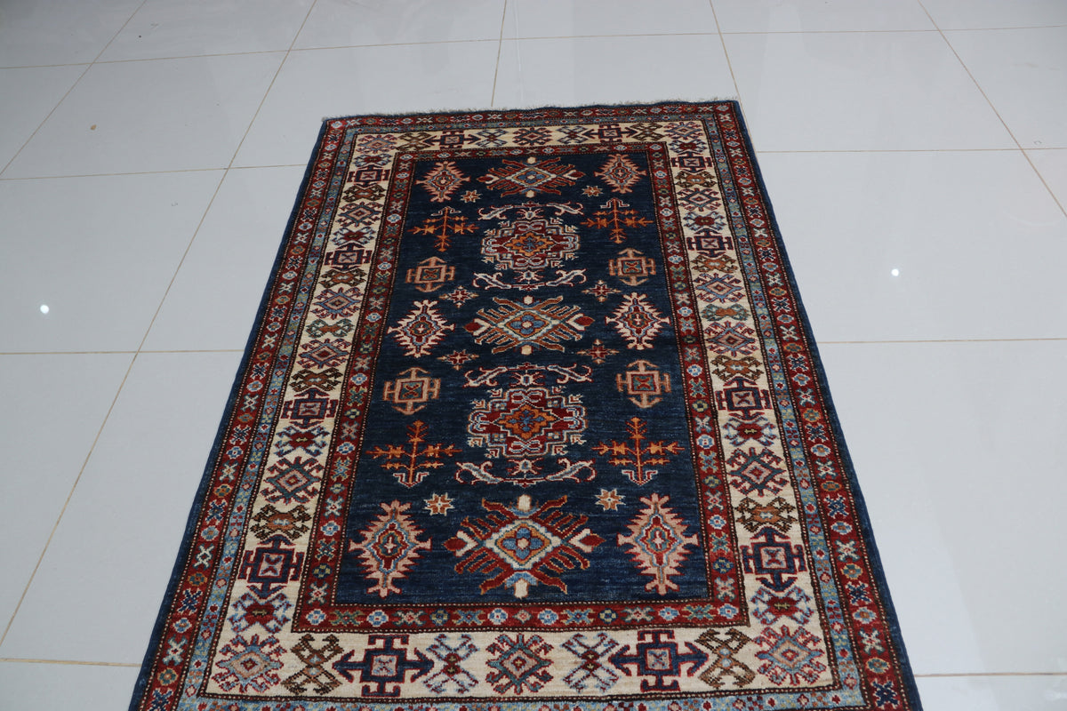 Detail 3 of blue floral Super Kazak cotton-and-wool rug, 3 x 5 ft
