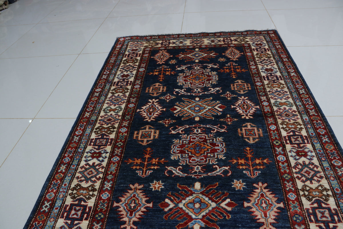 Detail 4 of blue floral Super Kazak cotton-and-wool rug, 3 x 5 ft