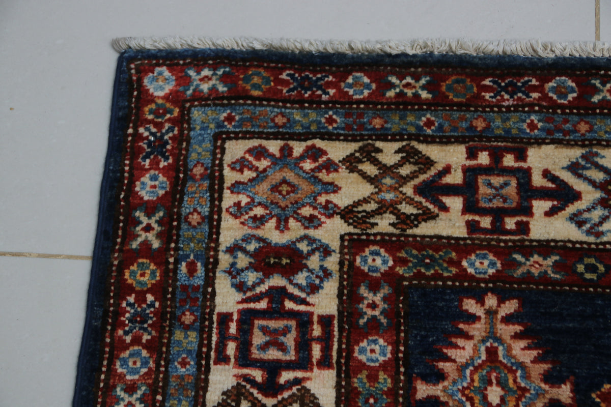 Detail 6 of blue floral Super Kazak cotton-and-wool rug, 3 x 5 ft