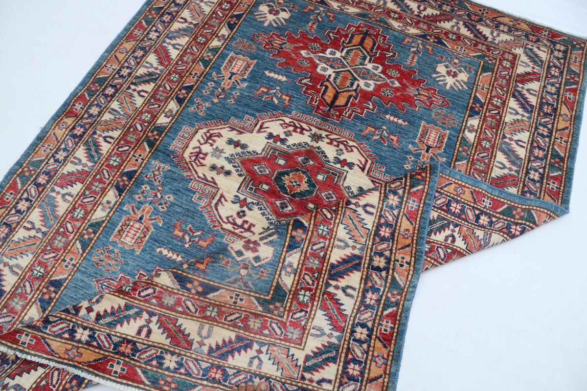 Detail 11 of blue floral Super Kazak cotton-and-wool rug, 5 x 7 ft
