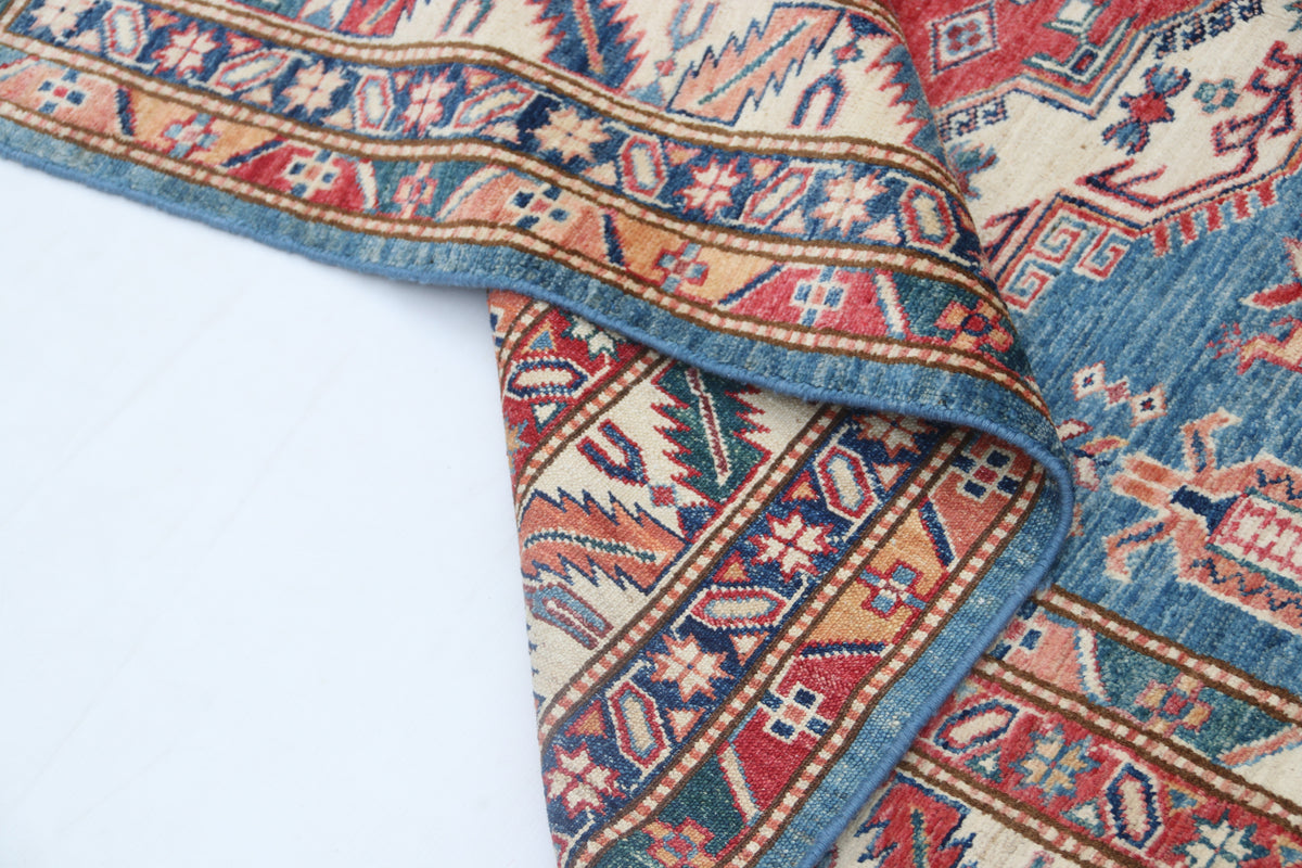 Detail 9 of blue floral Super Kazak cotton-and-wool rug, 5 x 7 ft