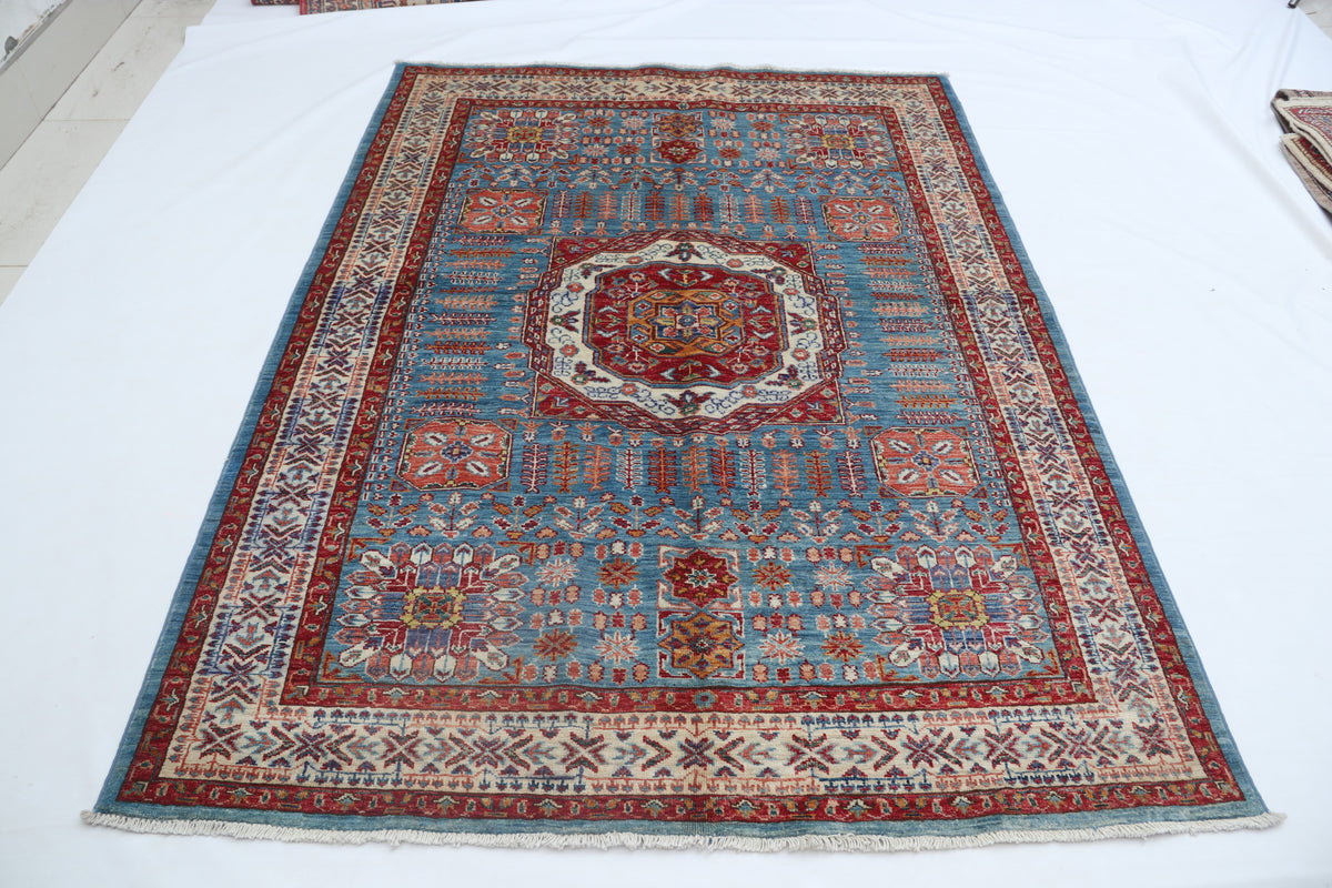 Detail 2 of blue floral Super Kazak cotton-and-wool rug, 5 x 7 ft