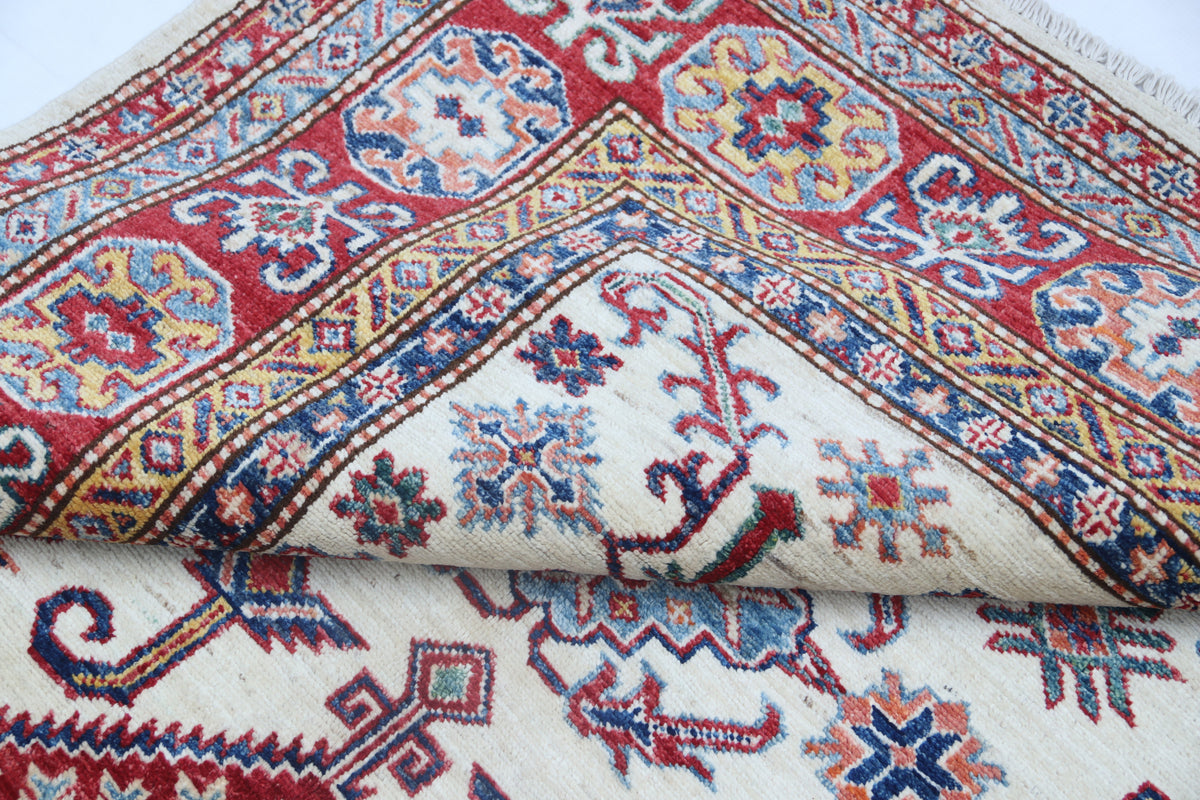 Detail 9 of beige floral Super Kazak cotton-and-wool rug, 5 x 7 ft