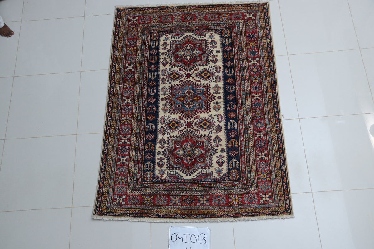 Detail view 2 of beige Super Kazak handwoven wool rug, 5 x 7 ft