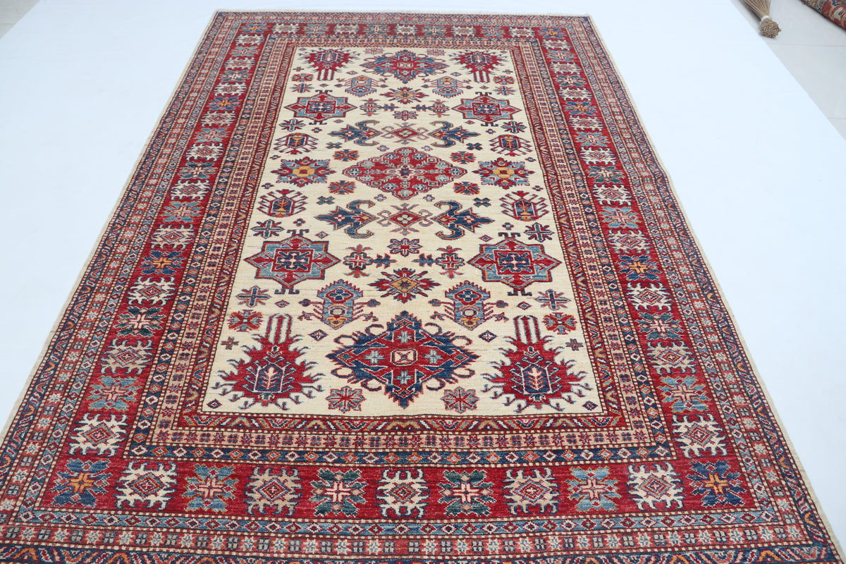 Detail 2 of beige floral Super Kazak cotton-and-wool rug, 5.5 x 8 ft