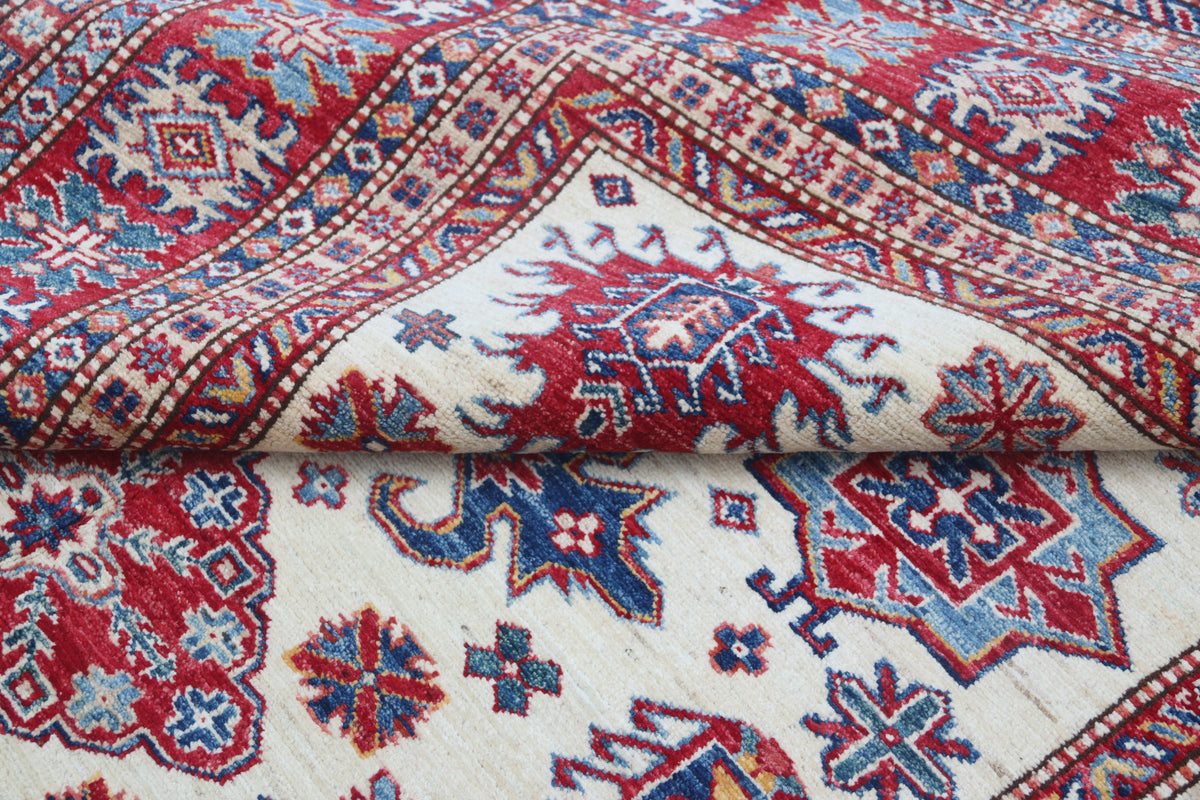 Detail 7 of beige floral Super Kazak cotton-and-wool rug, 5.5 x 8 ft