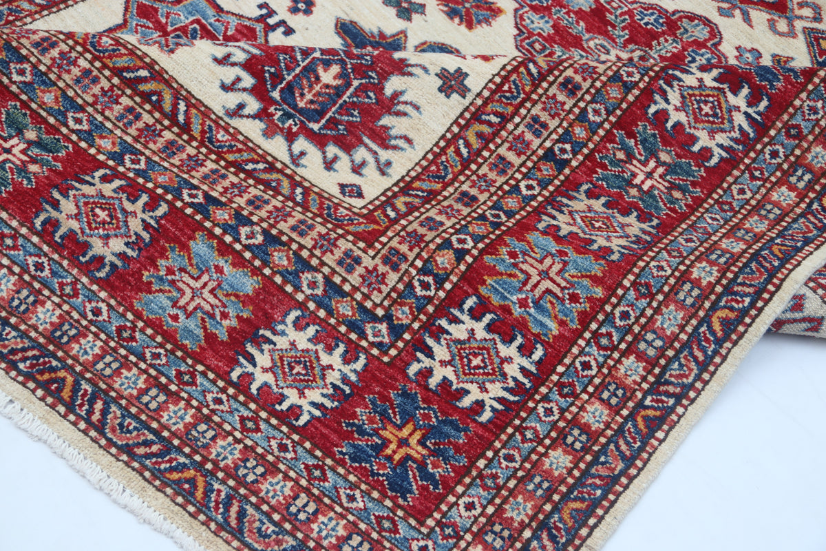 Detail 9 of beige floral Super Kazak cotton-and-wool rug, 5.5 x 8 ft