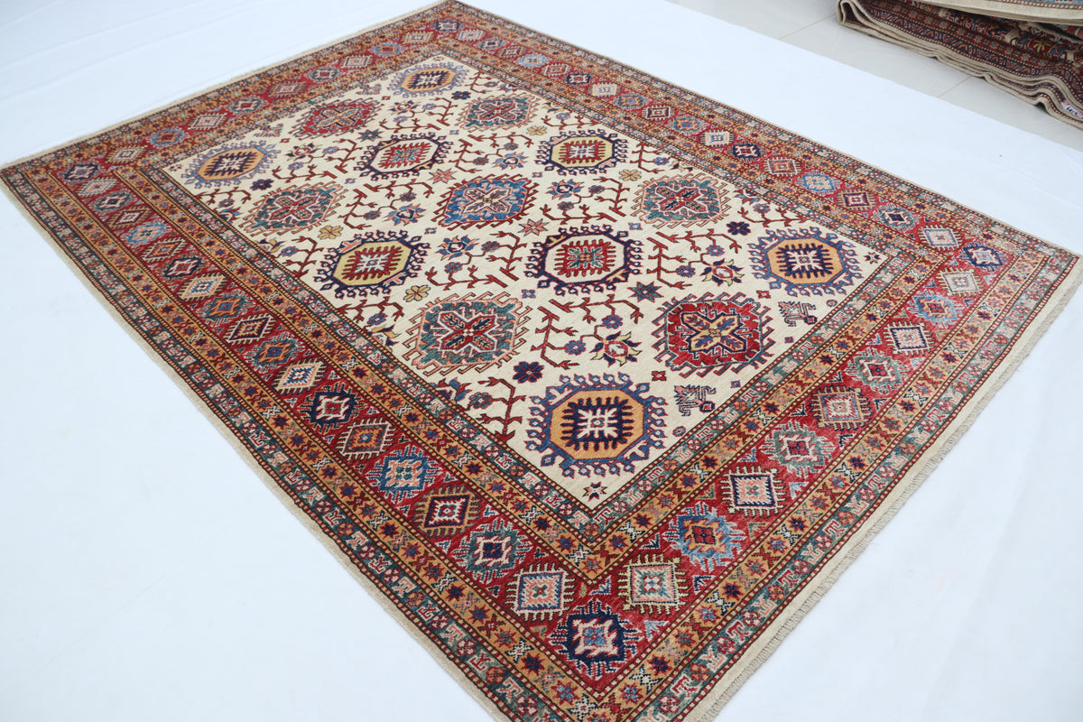 Detail 3 of beige floral Super Kazak cotton-and-wool rug, 5.5 x 8 ft