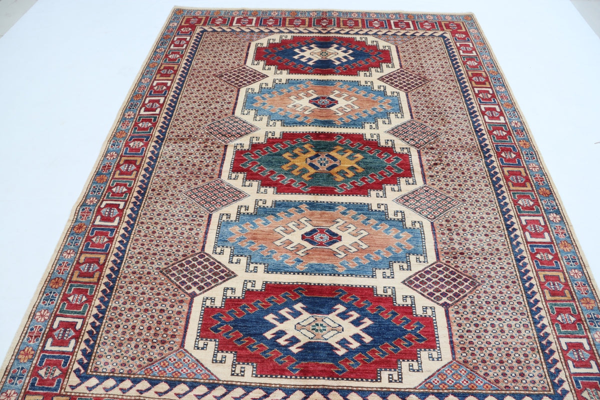 Detail 2 of beige floral Super Kazak cotton-and-wool rug, 5.5 x 8 ft