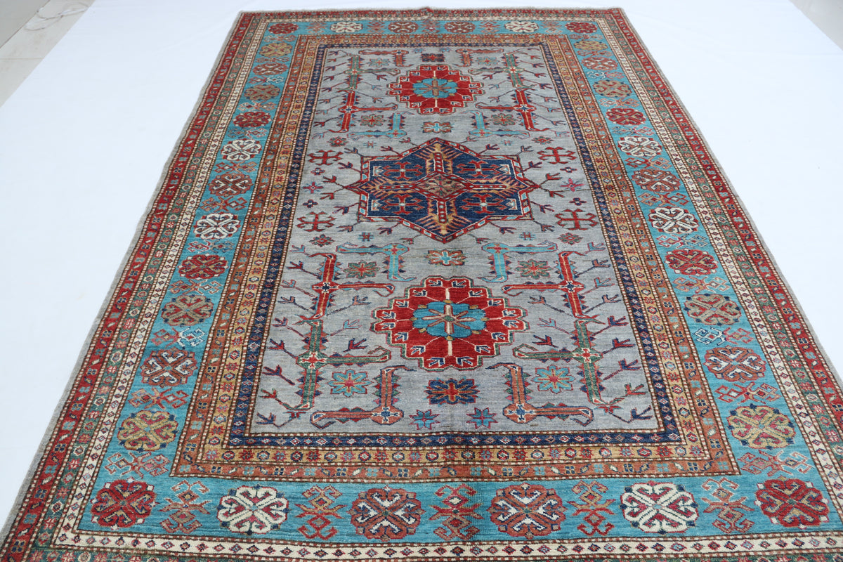 Detail 2 of gray floral Super Kazak cotton-and-wool rug, 5.5 x 8 ft