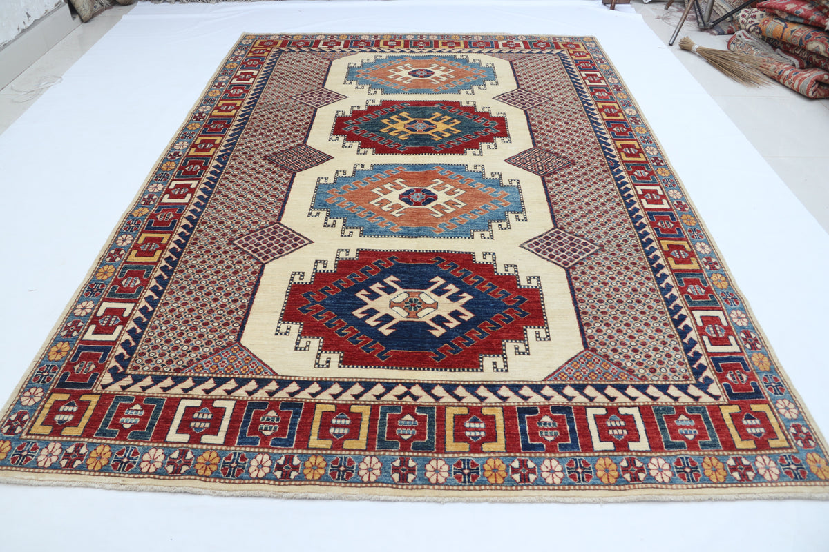 Detail 2 of beige floral Super Kazak cotton-and-wool rug, 6.5 x 9.5 ft