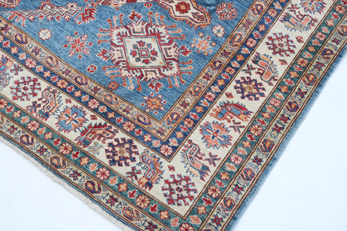Detail 8 of blue floral Super Kazak cotton-and-wool rug, 7 x 10 ft