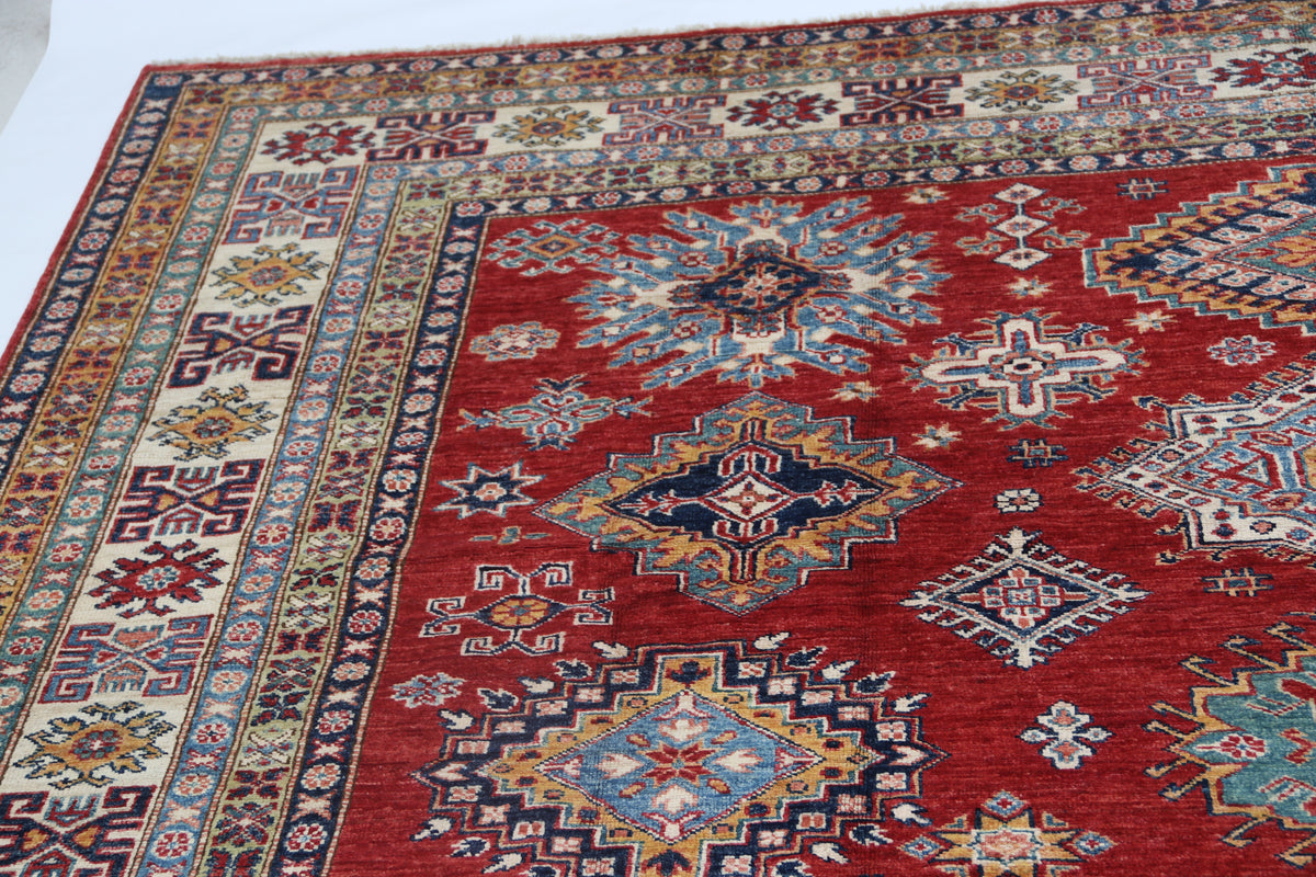 Detail 4 of red floral Super Kazak cotton-and-wool rug, 8 x 10 ft
