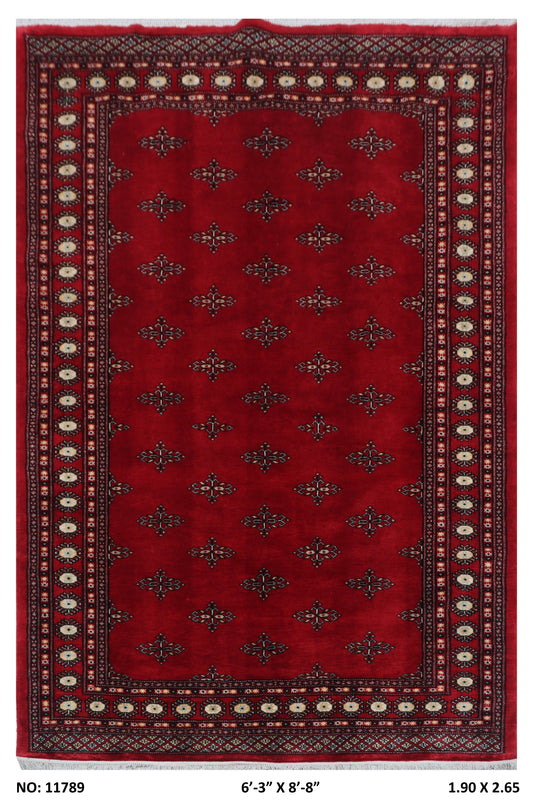 Full view of red Mori Bokhara handwoven wool rug, 6 x 9 ft