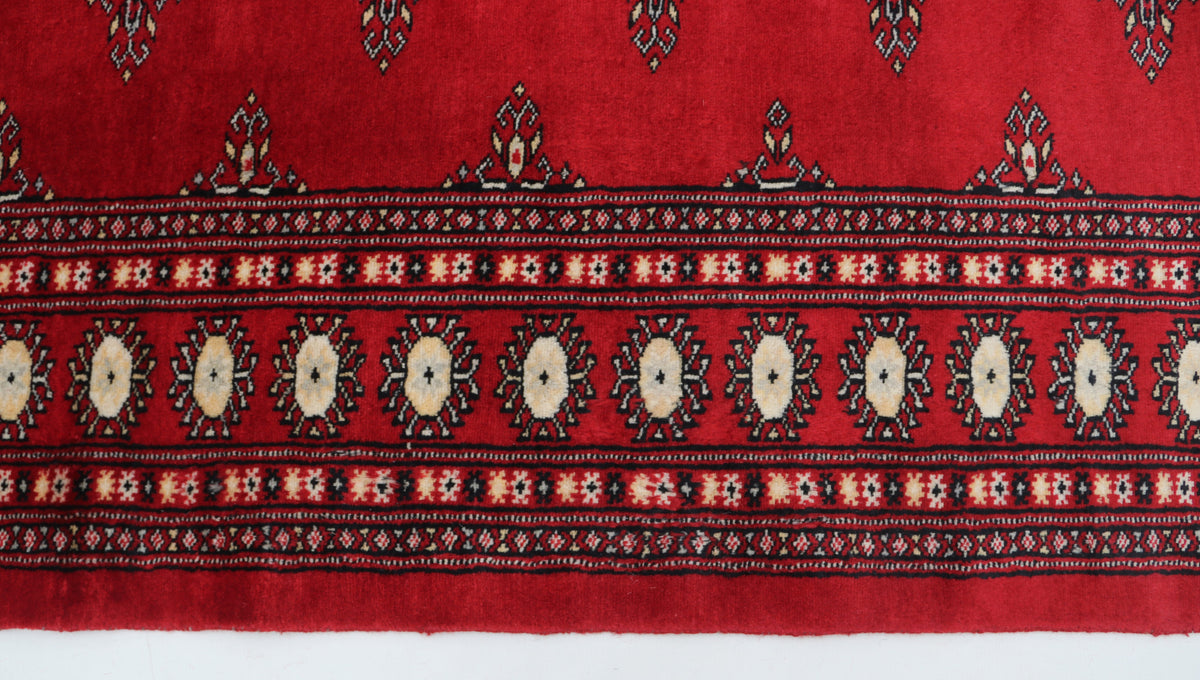 Detail view 3 of red Mori Bokhara handwoven wool rug, 6 x 9 ft
