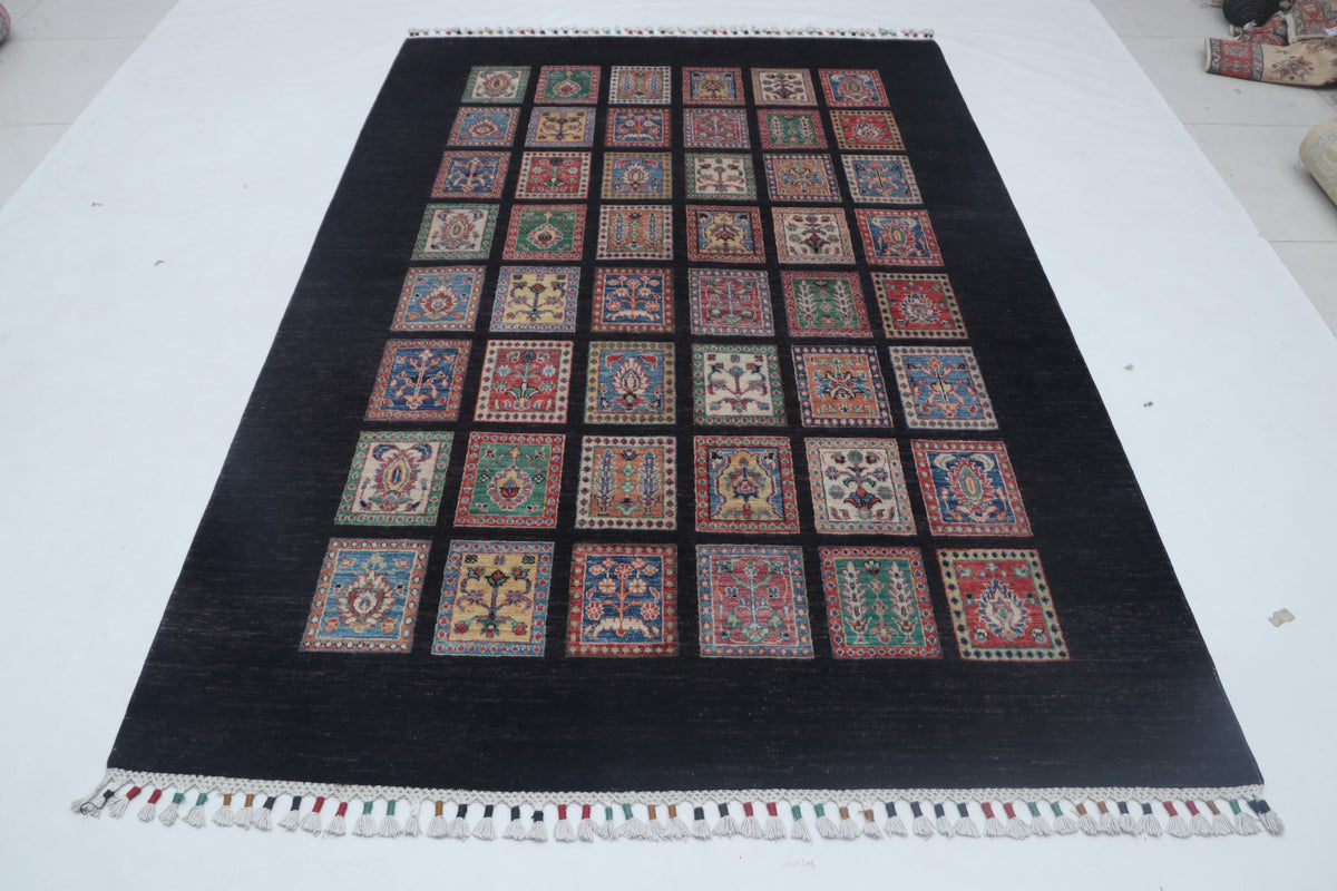 Detail view 2 of black Chobi 35/40 handwoven wool rug, 5.5 x 8 ft