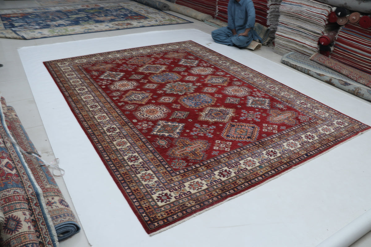 Detail view 3 of red Super Kazak handwoven wool rug, 8 x 10 ft