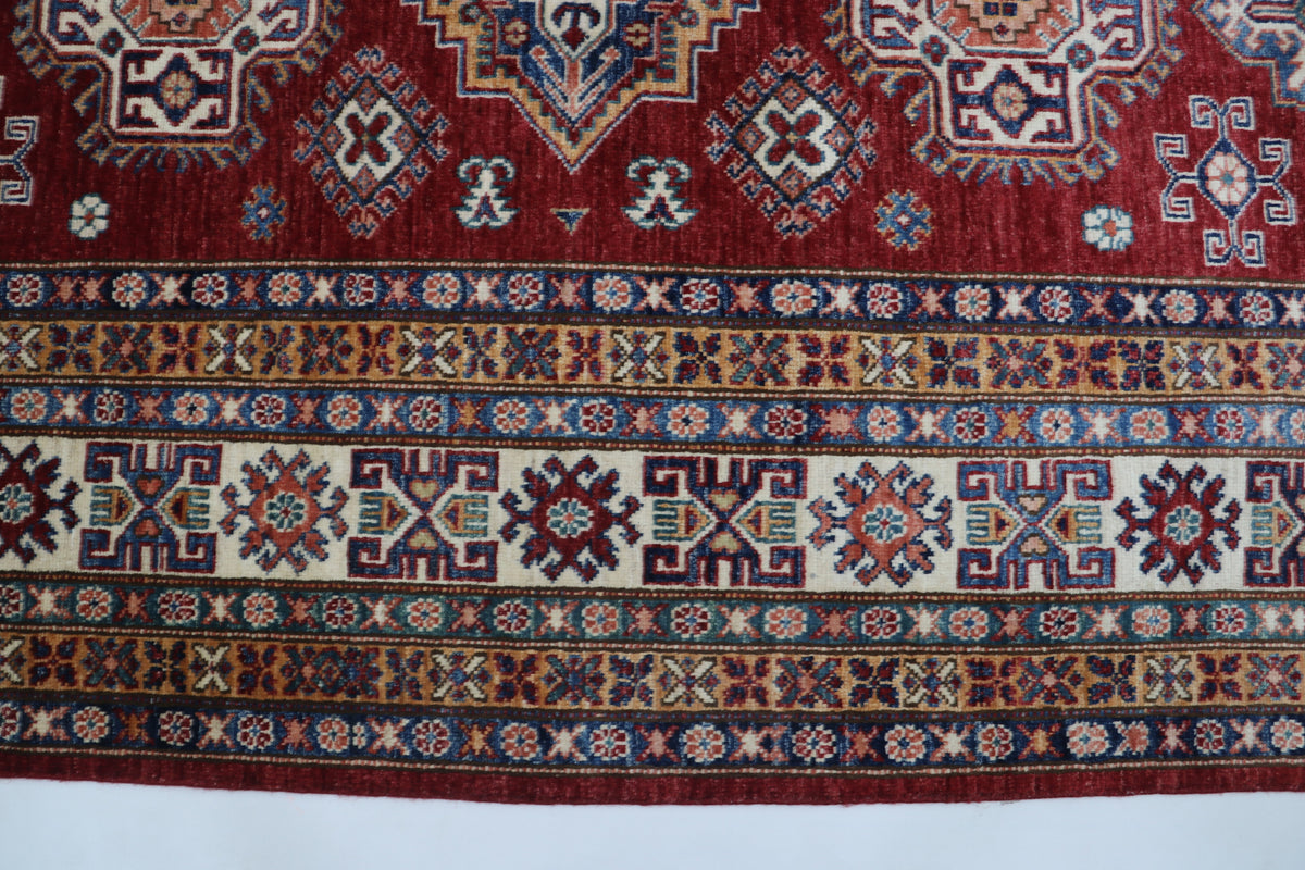 Detail view 4 of red Super Kazak handwoven wool rug, 8 x 10 ft