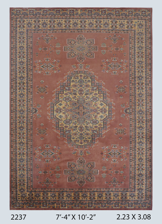 Full view of orange Kafkazi handwoven wool rug, 7 x 10 ft