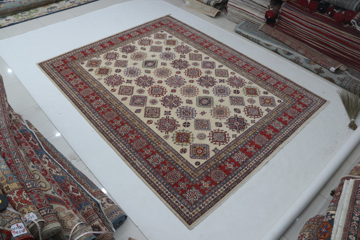 Detail view 2 of beige Super Kazak handwoven wool rug, 8 x 10 ft