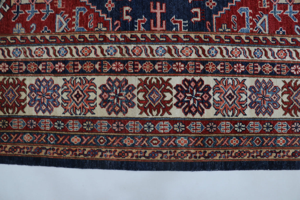 Detail view 3 of blue Super Kazak handwoven wool rug, 9 x 12 ft
