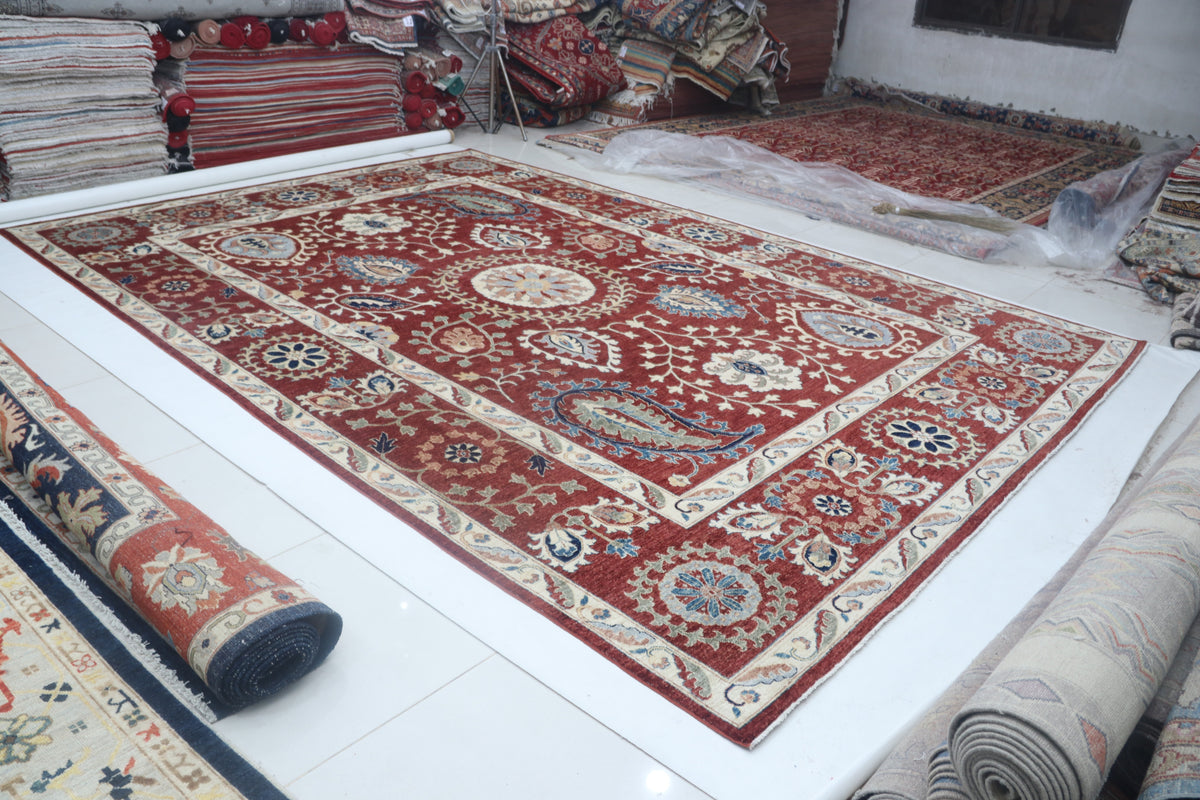 Detail view 3 of red Chobi 35/40 handwoven wool rug, 10 x 14 ft
