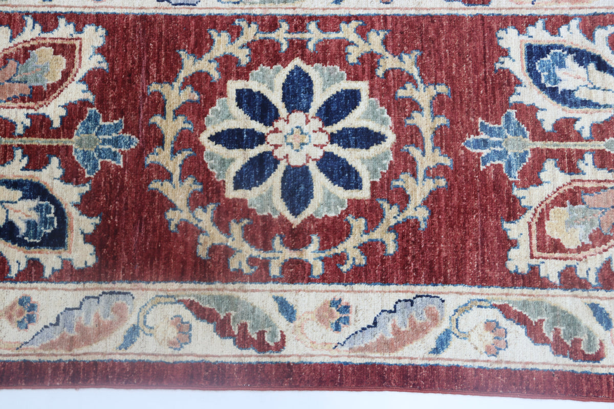 Detail view 4 of red Chobi 35/40 handwoven wool rug, 10 x 14 ft