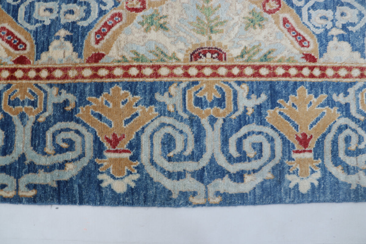Detail view 3 of blue Chobi 35/40 handwoven wool rug, 6 x 9 ft