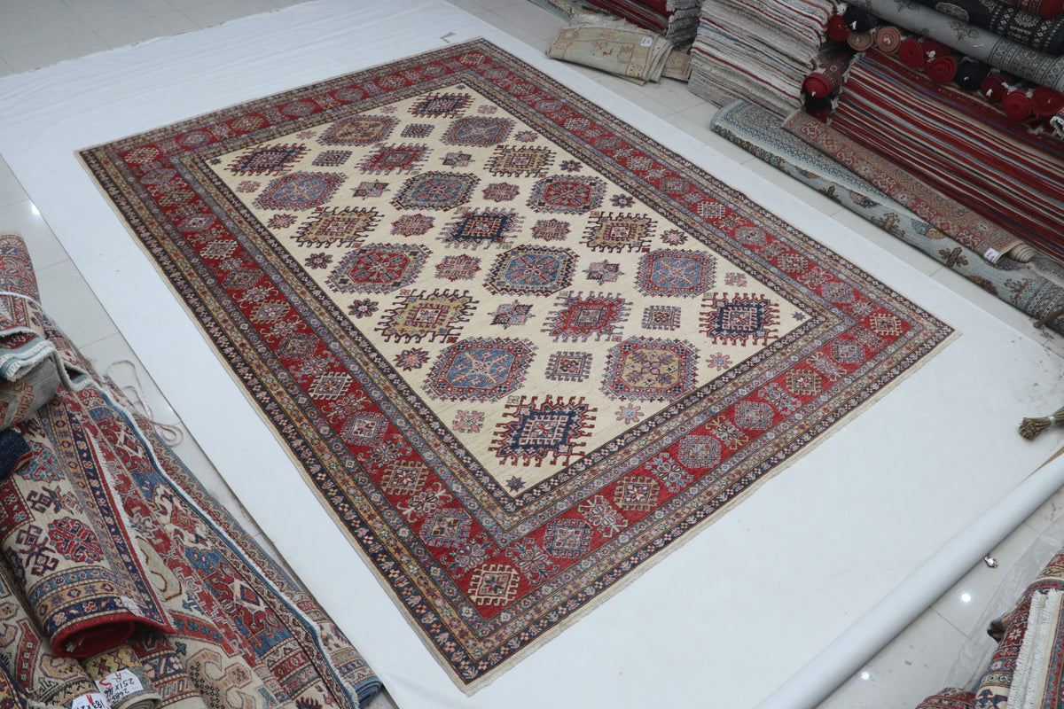 Detail view 2 of beige Super Kazak handwoven wool rug, 9 x 12 ft