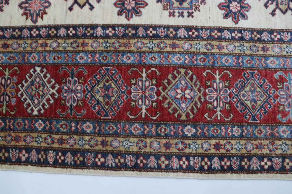 Detail view 3 of beige Super Kazak handwoven wool rug, 9 x 12 ft