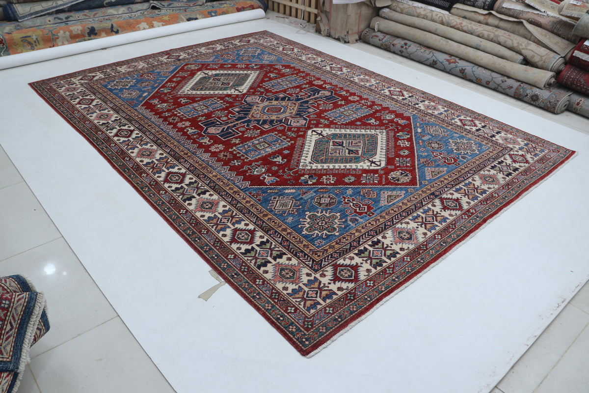 Detail view 2 of red Super Kazak handwoven wool rug, 8 x 11 ft