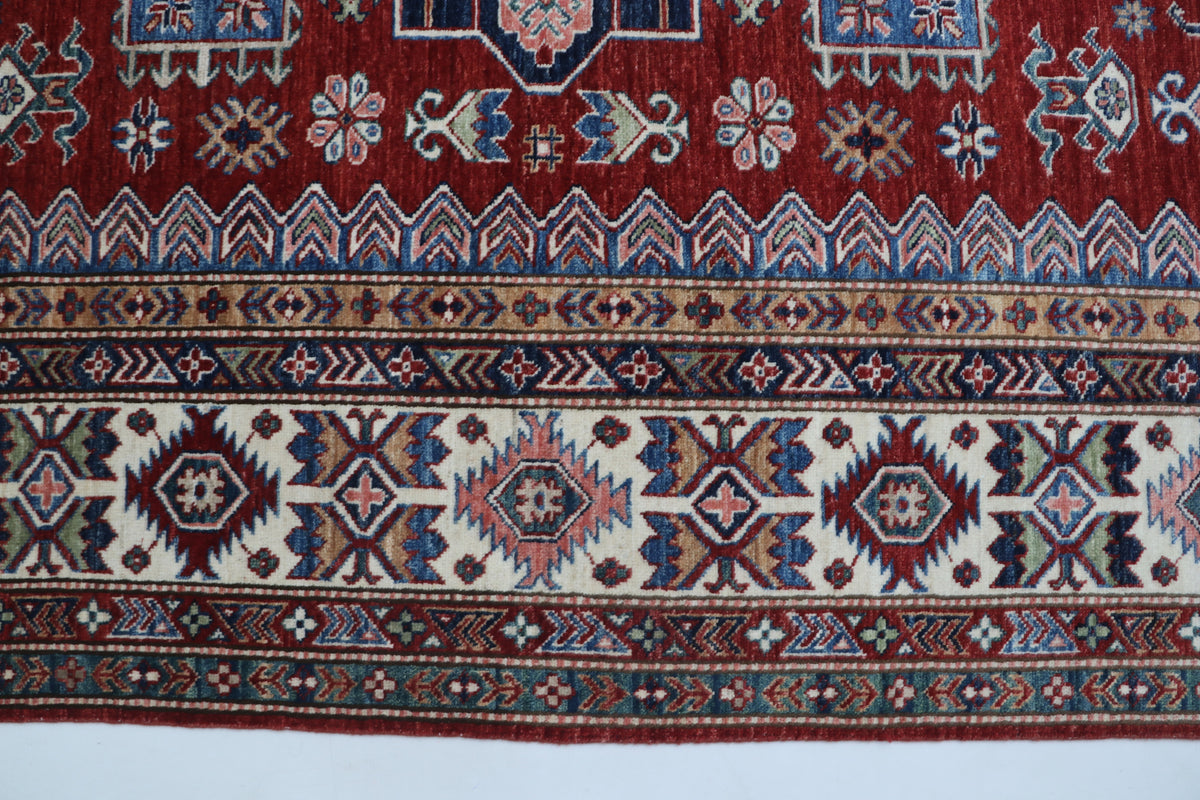 Detail view 3 of red Super Kazak handwoven wool rug, 8 x 11 ft