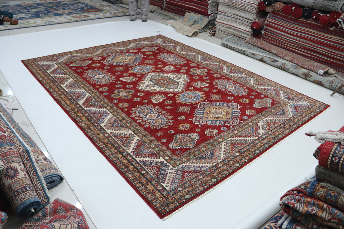 Detail view 2 of red Super Kazak handwoven wool rug, 8 x 10 ft