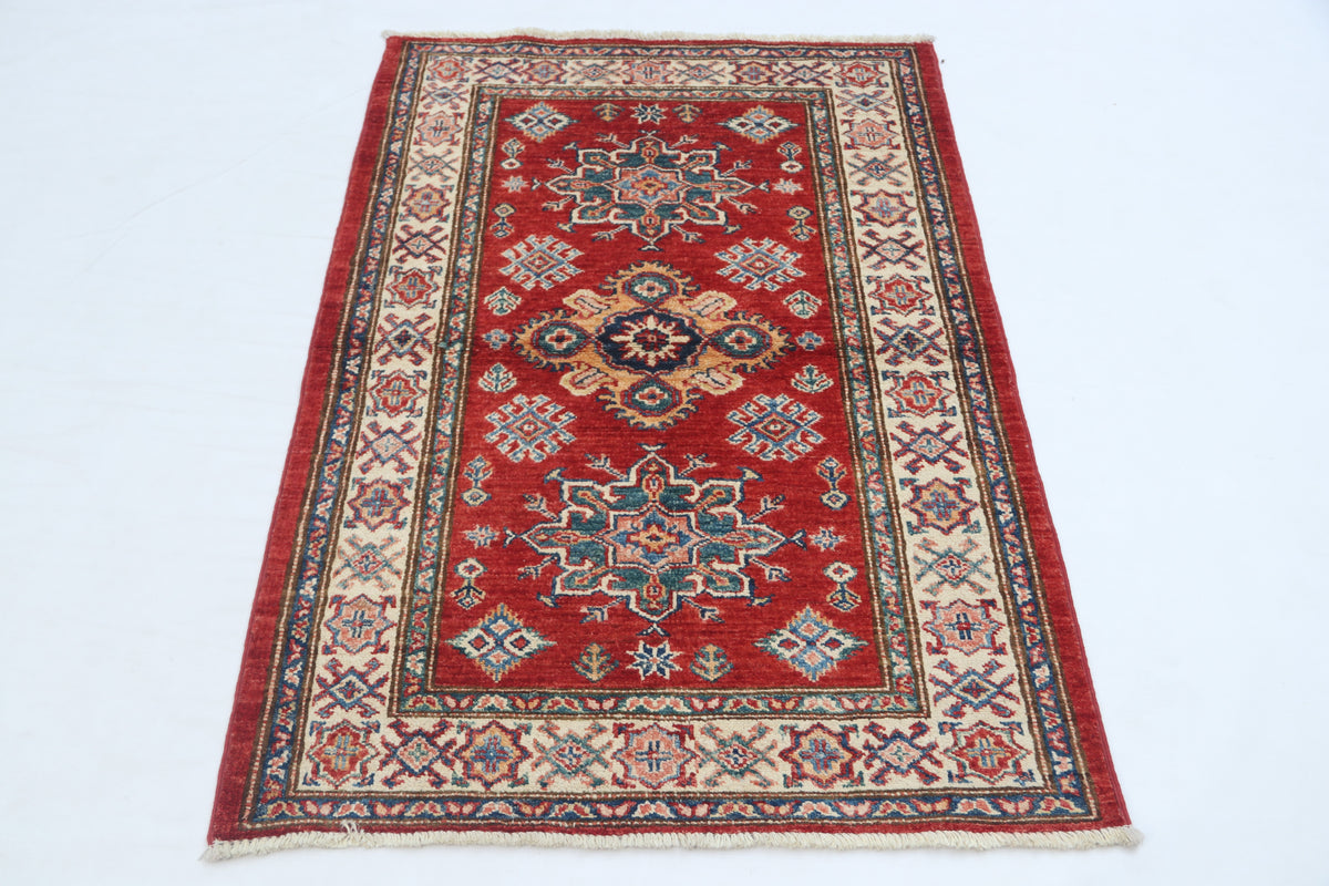 Detail view 2 of red Super Kazak handwoven wool rug, 2.5 x 4 ft