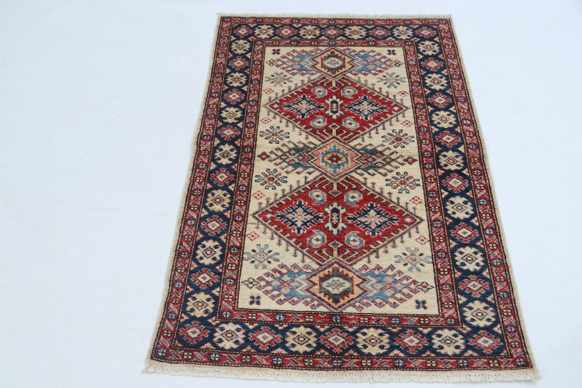 Detail view 2 of beige Super Kazak handwoven wool rug, 2.5 x 4 ft