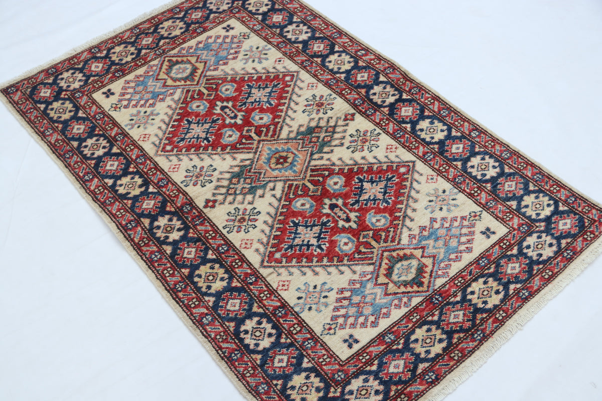 Detail view 3 of beige Super Kazak handwoven wool rug, 2.5 x 4 ft